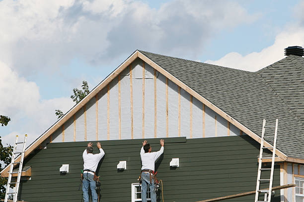 Professional Siding Installation technician working in Charlottesville, VA
